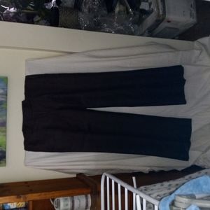 100% Linen H&M Slacks, size 8.  Dry cleaned and pressed, smoke free environment.